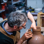 Doug Fitch and Hannah McAndrew making a jug for me